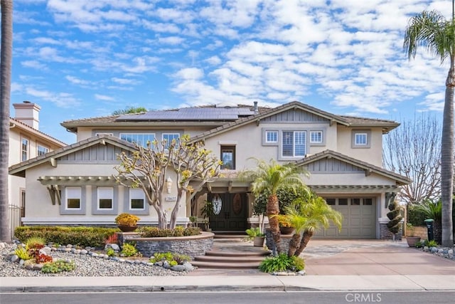 28622 Point Loma, Laguna Niguel, CA 92677 - craftsman house with concrete driveway, solar panels, a garage, and stucco siding