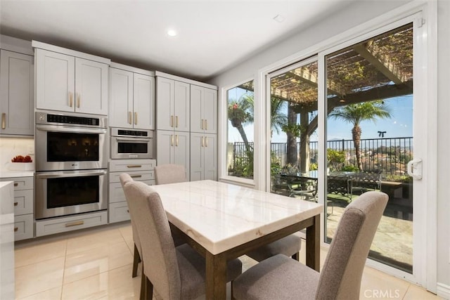 28622 Point Loma, Laguna Niguel, CA 92677 - dining space featuring light tile patterned flooring and recessed lighting
