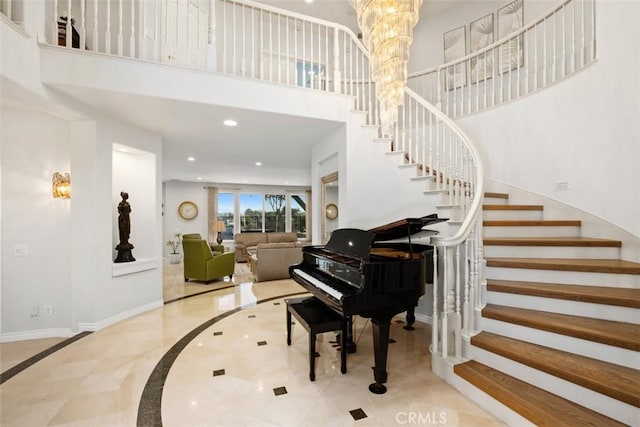 28622 Point Loma, Laguna Niguel, CA 92677 - entrance foyer with inlaid floor details, a towering ceiling, stairs, baseboards, and recessed lighting