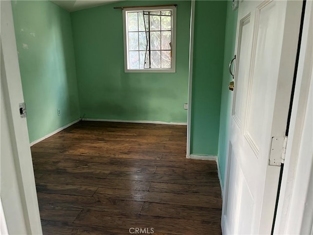 empty room featuring dark hardwood / wood-style floors