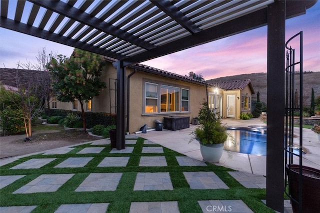 view of patio featuring a pergola