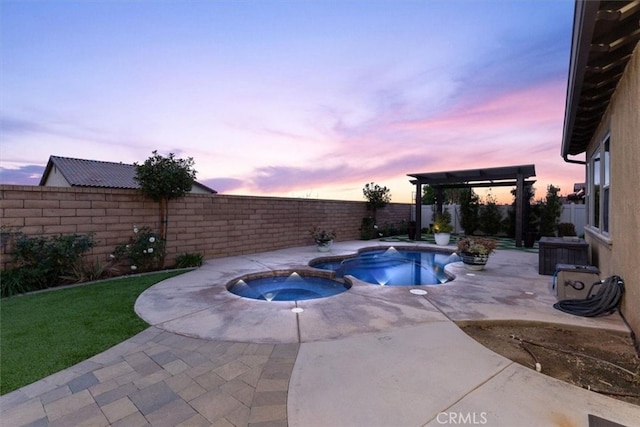 pool at dusk featuring a pool with connected hot tub, a fenced backyard, and a patio