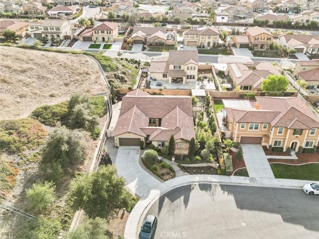 birds eye view of property with a residential view