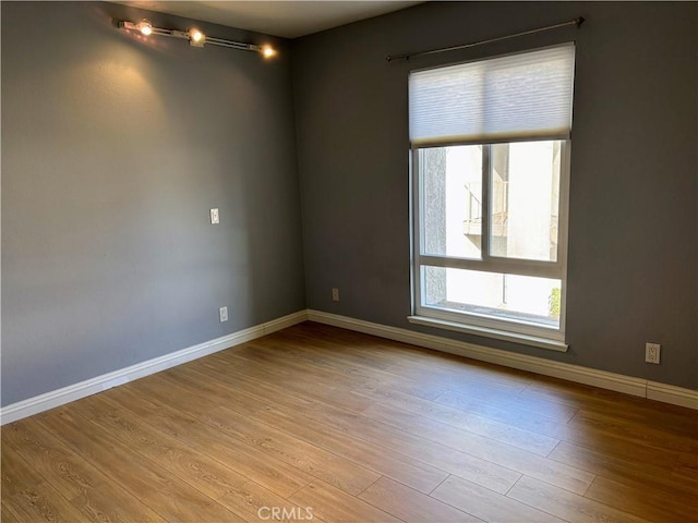 empty room featuring light hardwood / wood-style floors