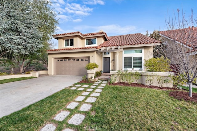 mediterranean / spanish home featuring a front lawn, a tiled roof, driveway, and stucco siding