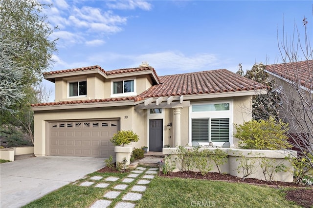 mediterranean / spanish home featuring a tile roof, stucco siding, a chimney, a garage, and driveway