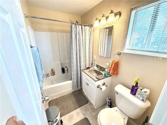 full bathroom with shower / tub combo with curtain, vanity, toilet, and tile patterned flooring