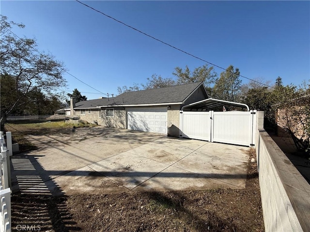 view of side of property featuring a garage