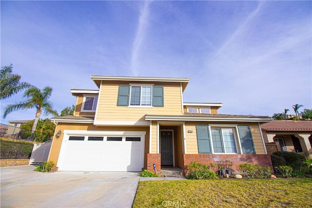 view of front facade with a garage and a front yard