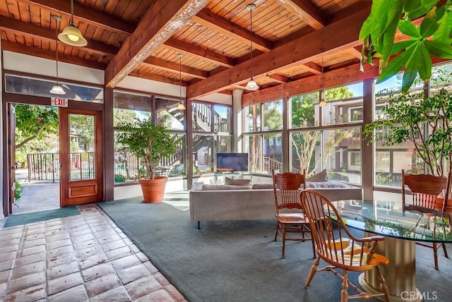 sunroom featuring wooden ceiling and beamed ceiling