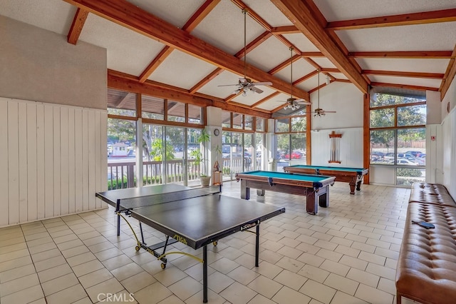 recreation room with wooden walls, high vaulted ceiling, light tile patterned flooring, pool table, and beamed ceiling