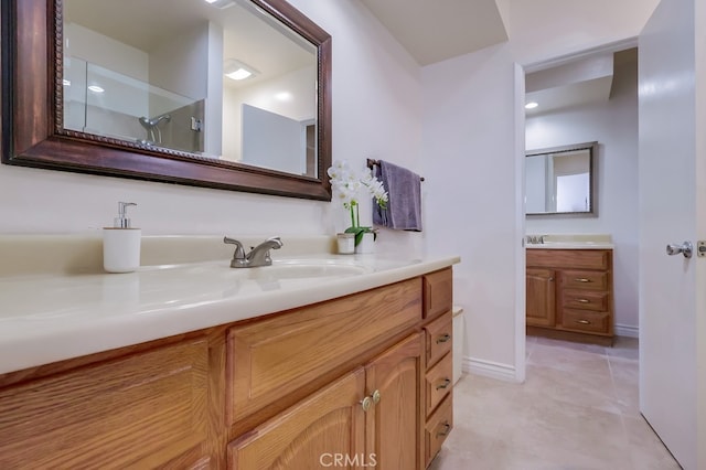 bathroom with vanity and tile patterned floors