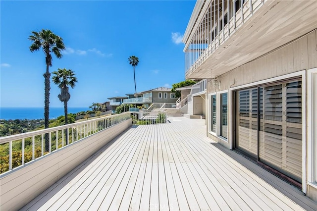 deck featuring a water view