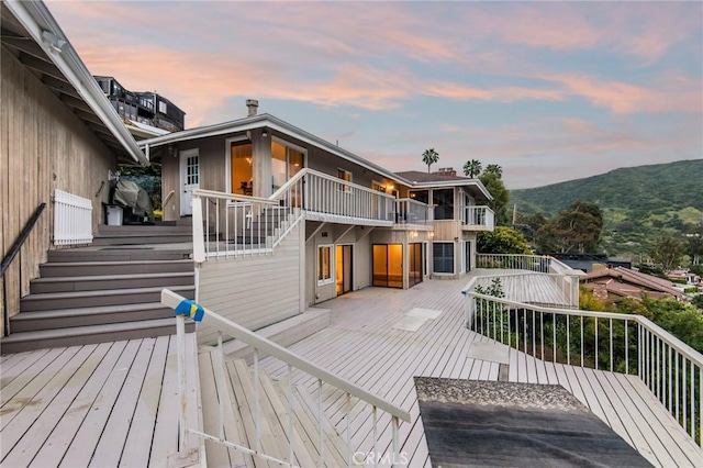 deck at dusk with a mountain view