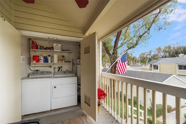 laundry room with washing machine and dryer