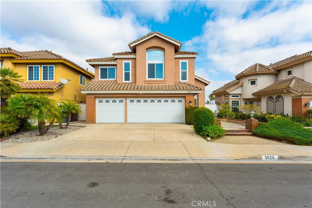 mediterranean / spanish-style house featuring a garage