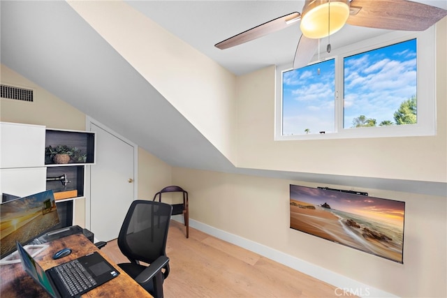 office area featuring ceiling fan, lofted ceiling, and light hardwood / wood-style floors