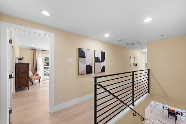 hallway featuring light hardwood / wood-style flooring