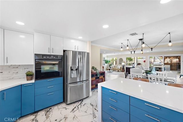 kitchen with black oven, tasteful backsplash, blue cabinets, white cabinets, and stainless steel fridge with ice dispenser