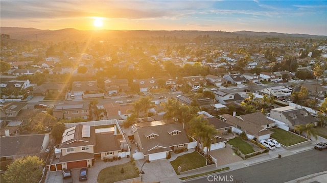 aerial view at dusk with a mountain view