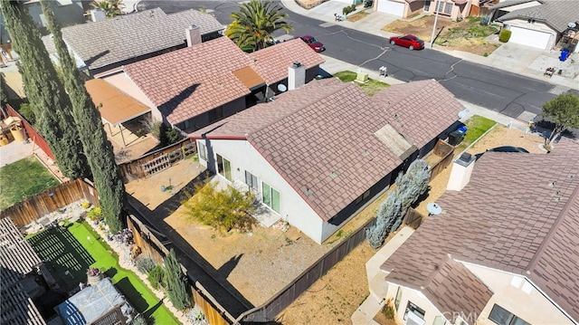 birds eye view of property with a residential view