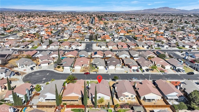 aerial view with a residential view and a mountain view