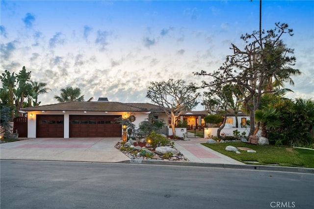 view of front of property with a garage