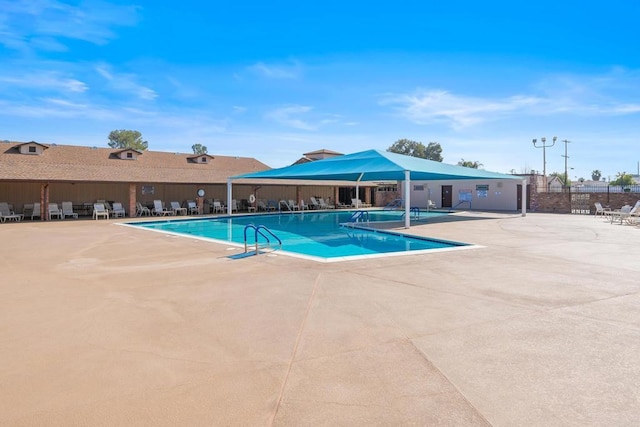 26639 Chambers Ave, Menifee, CA 92586 - pool with a patio and fence