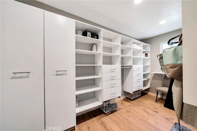 920 Quivera St, Laguna Beach, CA 92651 - walk in closet featuring wood-type flooring