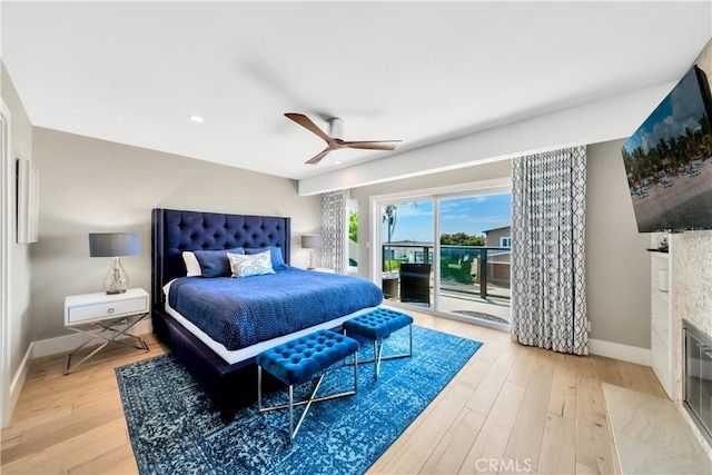 920 Quivera St, Laguna Beach, CA 92651 - bedroom featuring access to outside, a fireplace with flush hearth, light wood-style flooring, a ceiling fan, and recessed lighting