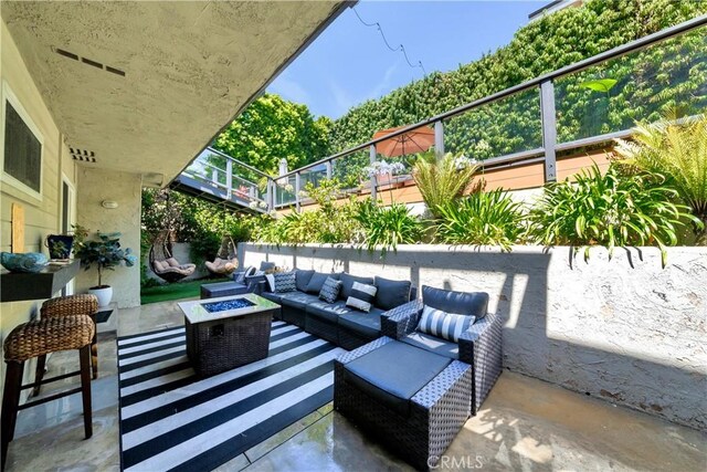 920 Quivera St, Laguna Beach, CA 92651 - view of patio / terrace featuring an outdoor living space with a fire pit
