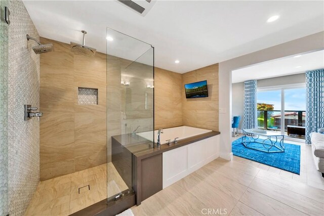920 Quivera St, Laguna Beach, CA 92651 - bathroom with a tile shower, a bath, and recessed lighting