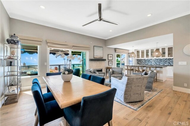 920 Quivera St, Laguna Beach, CA 92651 - dining room with ceiling fan, light wood-style floors, ornamental molding, and recessed lighting