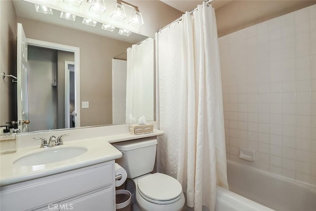 full bathroom with toilet, shower / bath combination with curtain, and vanity