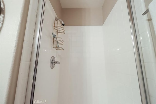 room details with an enclosed shower