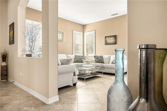 living room featuring light tile patterned floors