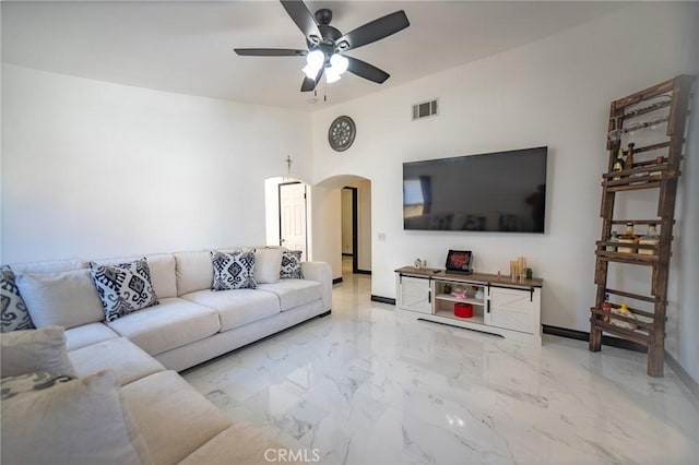 living room featuring ceiling fan