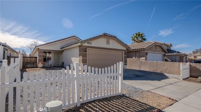 view of front of home with a garage