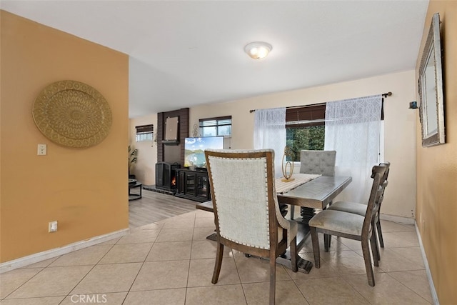 dining room featuring light tile patterned floors