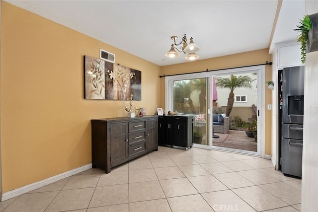 interior space featuring an inviting chandelier