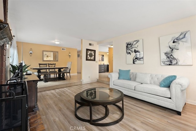 living room with hardwood / wood-style floors