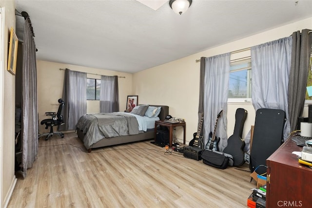 bedroom featuring light hardwood / wood-style flooring