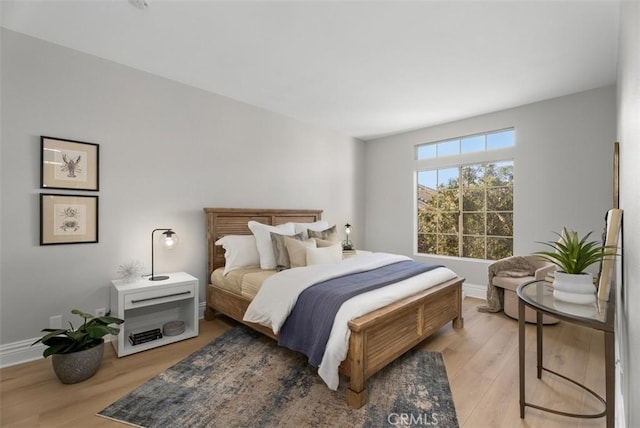 bedroom featuring light hardwood / wood-style floors