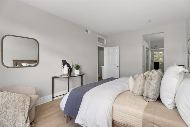 bedroom featuring light hardwood / wood-style flooring