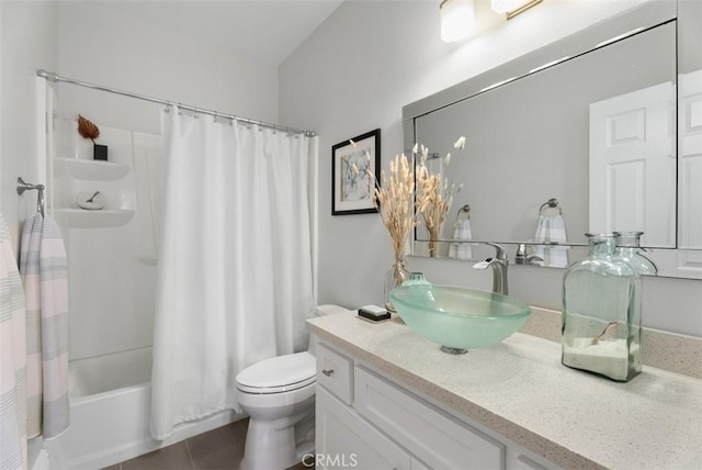 full bathroom featuring vanity, tile patterned floors, shower / bath combination with curtain, and toilet