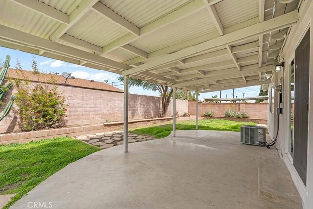 5594 Denver St, Montclair, CA 91763 - view of patio featuring a fenced backyard and central AC unit