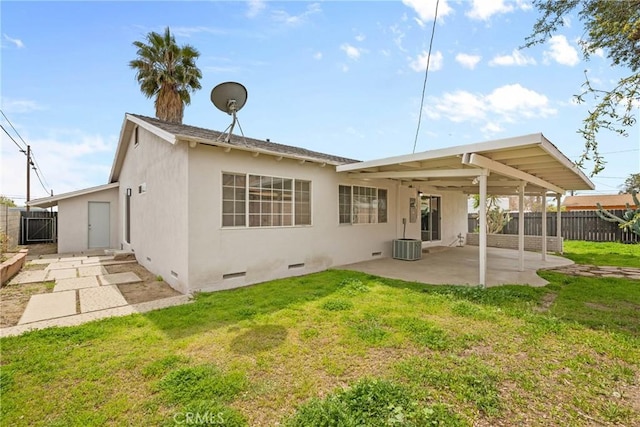 5594 Denver St, Montclair, CA 91763 - back of house with fence, crawl space, a patio area, and stucco siding