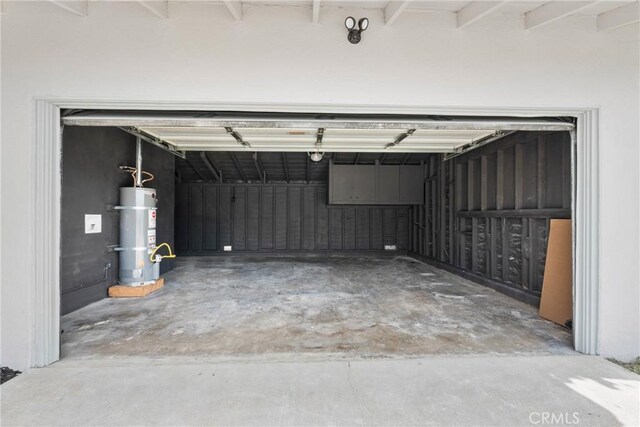 5594 Denver St, Montclair, CA 91763 - garage featuring secured water heater
