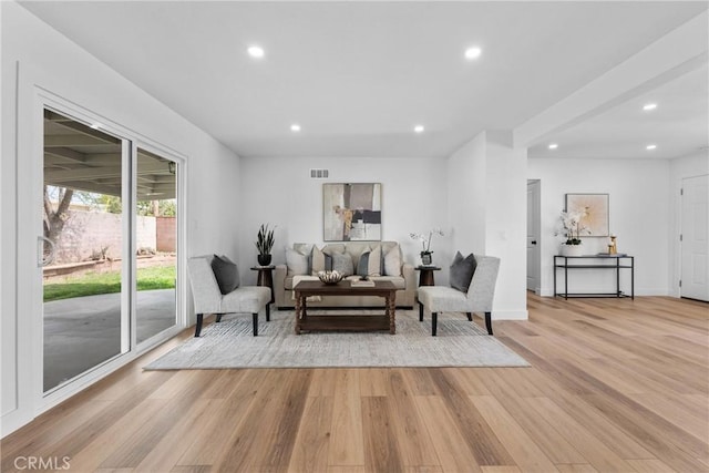 5594 Denver St, Montclair, CA 91763 - living area with light wood-type flooring, baseboards, visible vents, and recessed lighting
