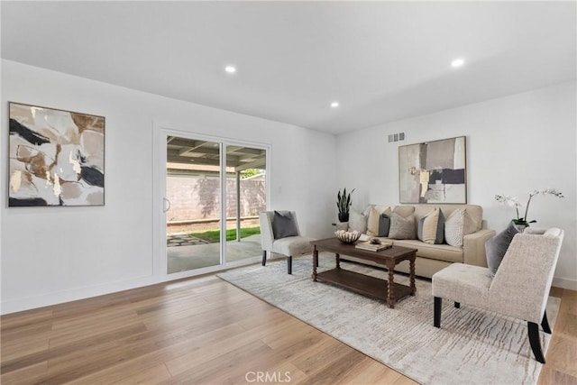 5594 Denver St, Montclair, CA 91763 - living area with baseboards, recessed lighting, visible vents, and light wood-type flooring